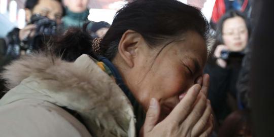 Keluarga penumpang Malaysia Airlines datangi bandara Beijing