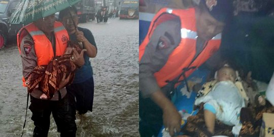 Heroiknya anggota Polda Jabar evakuasi bayi korban banjir