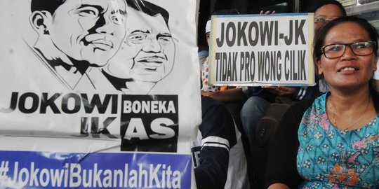 Aksi puluhan aktivis demo 100 hari Jokowi-JK di KPK