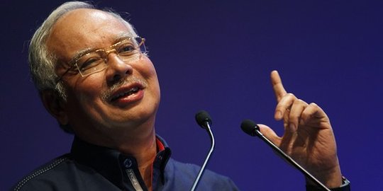 Dipaksa mundur karena tuduhan korupsi, PM Malaysia menolak