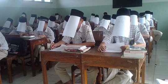 Biasakan jujur, sekolah ini wajibkan siswa menutup wajah saat ujian