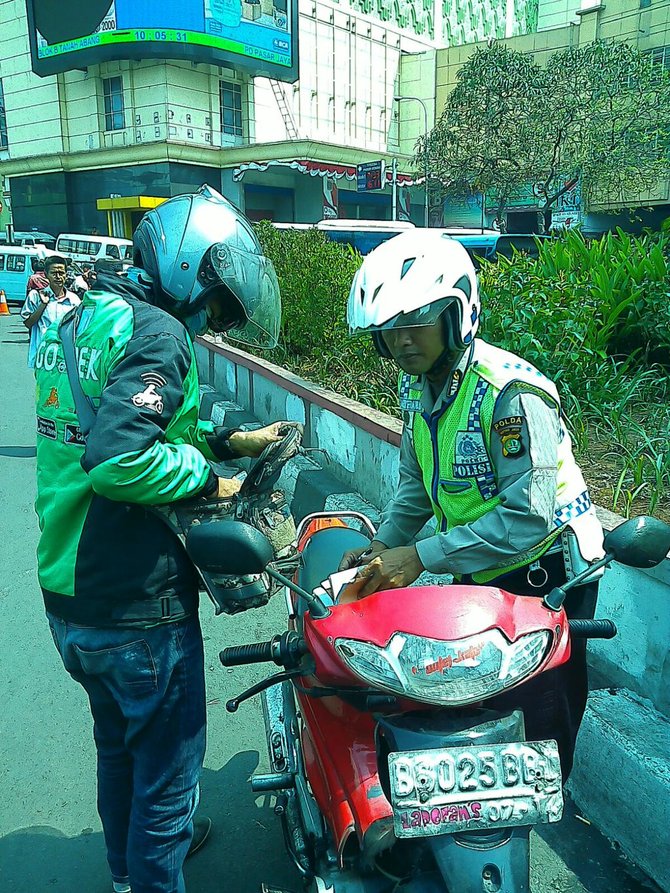 go jek ditilang polisi