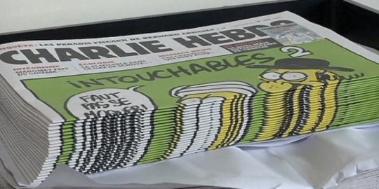 Satu per satu, anggota redaksi tabloid satir Charlie Hebdo keluar