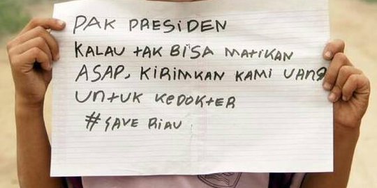 'Pak presiden kalau tak bisa matikan asap, kirimkan kami uang'