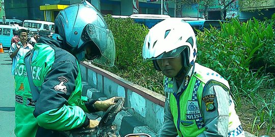 PT GO-JEK Indonesia buat sistem kontrol driver berbasis data tilang