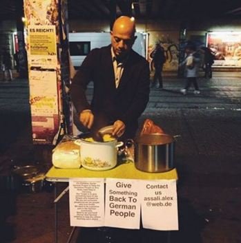 pengungsi suriah masak untuk gelandangan jerman