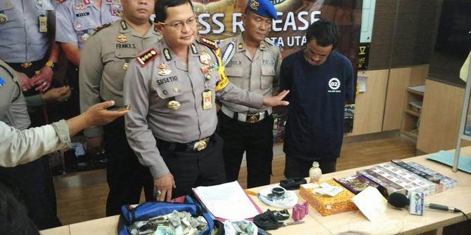 Congkel pintu  minimarket Risyan curi rokok dan bobol 