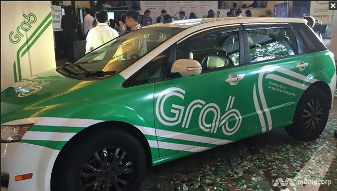 taksi dengan logo baru grab