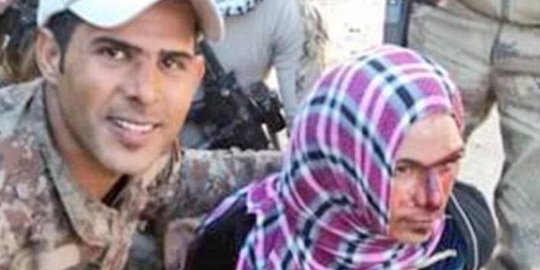 militan isis ketahuan menyamar sebagai perempuan rev3