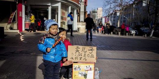 china jual anak demi pengobatan kanker putri kembarnya rev2