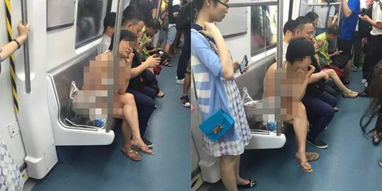 Perempuan China hampir bugil di kereta bawah tanah bikin heboh