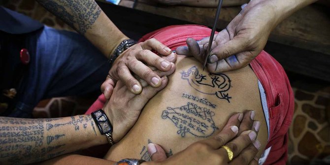 Myanmar deportasi turis sebab pakai tato  Buddha di 