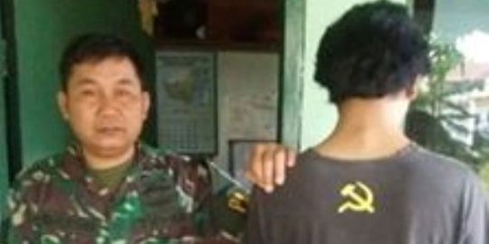 Pakai kaos bergambar palu arit, Rizki ditangkap prajurit TNI