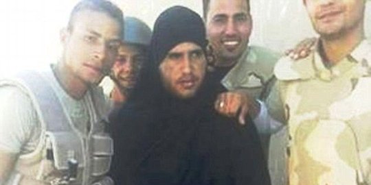 tangkap anggota isis menyamar jadi wanita pakai burka rev2