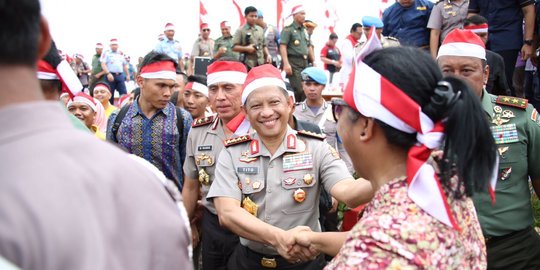 Massa 2-12 soraki Kapolri Jendral Tito saat pidato di Monas