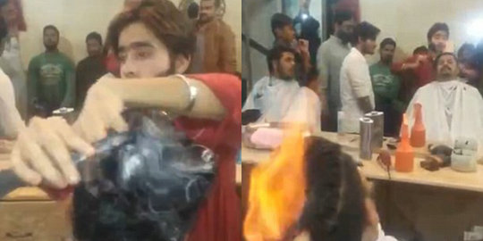 Ekstrem, tukang cukur Pakistan gunting rambut pelanggan pakai api!