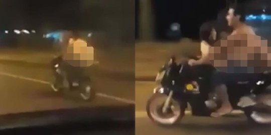 Pasangan ini tertangkap kamera lagi ngeseks di atas motor