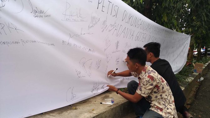 aksi tanda tangan dukung go jek