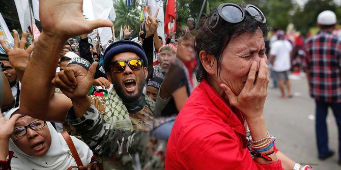 reaksi massa pendukung dan pembenci ahok