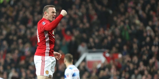 Rooney masih ingin bertahan di MU