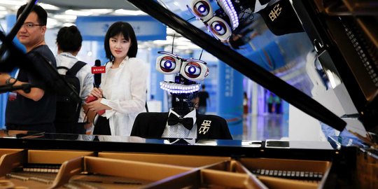 Tampil di Konferensi Robot Dunia, robot piano ini menghipnotis pengunjung