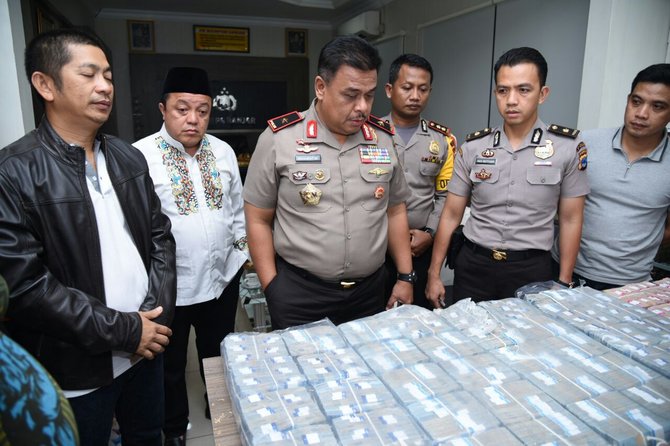 polda kalimantan selatan tangkap polisi yang bawa kabur uang rp 10 m