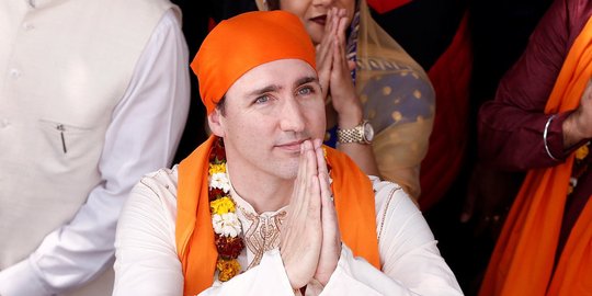 Gaya PM Justin Trudeau berkunjung ke kuil emas India