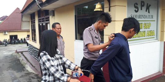 Sejoli kepergok curi helm di sekolah