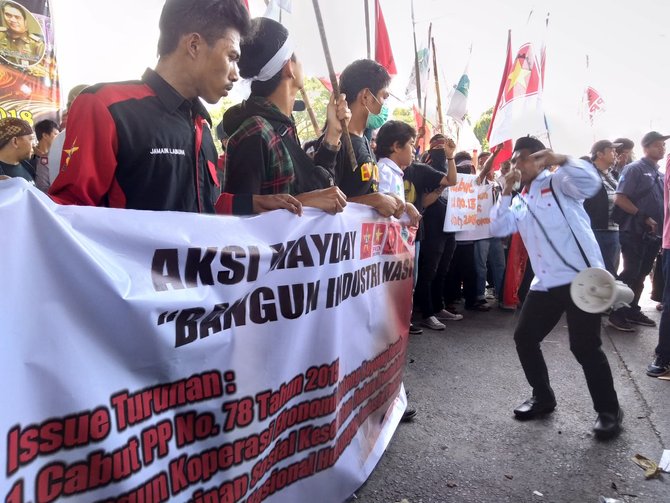 aksi may day di makassar