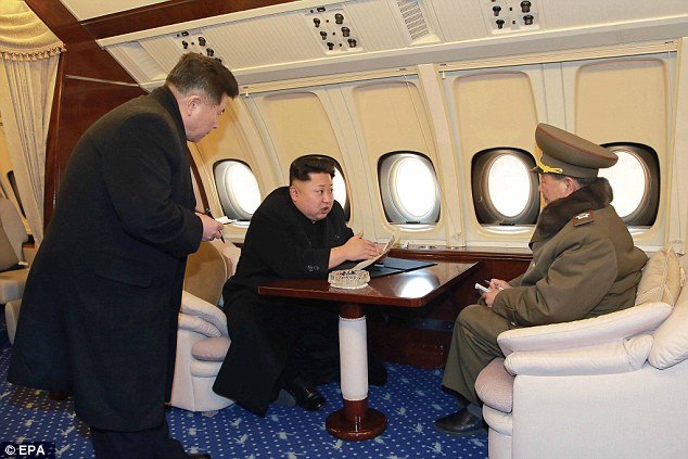 kim jong un di dalam pesawat pribadinya ilyushin il 62