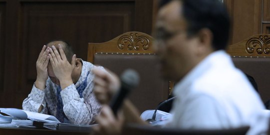 Ekspresi Syafruddin Arsyad Temenggung saat jalani sidang lanjutan korupsi SKL BLBI