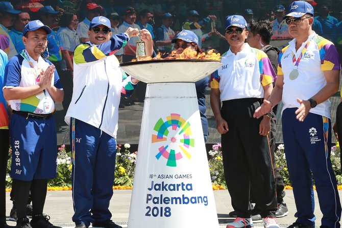 bri meriahkan gelaran kirab obor asian games 2018