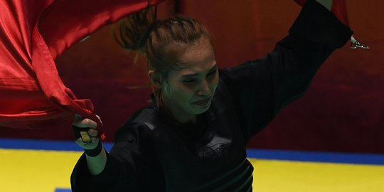 Selebrasi pesilat Wita Wewey usai sukses raih emas ke-30 Indonesia