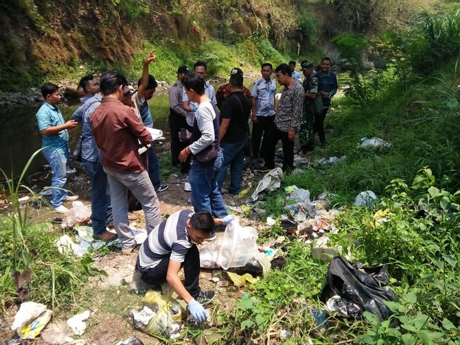 pembuangan limbah medis di sungai