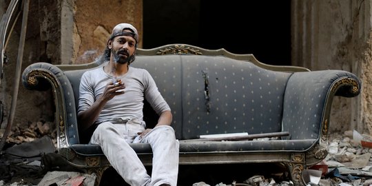 Kisah penjaga merpati bertahun-tahun bertahan dari perang Suriah