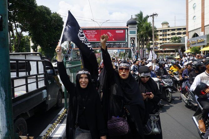 protes pembakaran bendera tauhid di medan