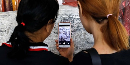 Cara Unik Orang Thailand Berburu Nomor Lotre