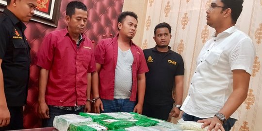 2 Kurir Jaringan Malaysia Dibekuk, 12 Kg Sabu dan 37.082 Pil Ekstasi Disita