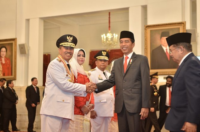 h syamsuar dan h edy aprizal natar nasution sebagai gubernur riau dan wakil gubernur riau periode 2019 2024