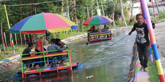 Menyulap Drainase Banyak Sampah Menjadi Wisata Murah