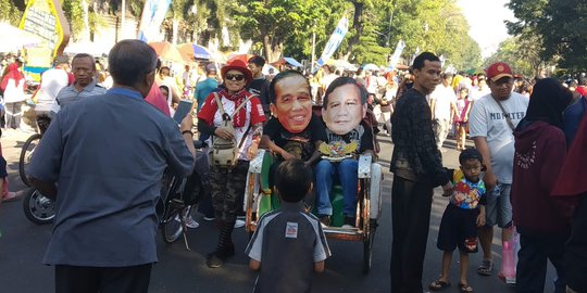 'Jokowi dan Prabowo' Naik Becak Bareng di Solo
