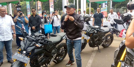 Cegah Kecelakaan di Jalan Raya, BPJS Ketenagakerjaan Bagikan Helm untuk Peserta