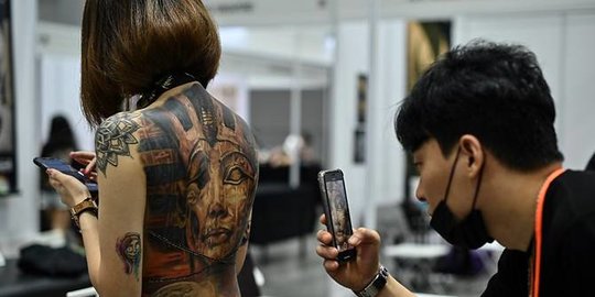 Pameran Tato di Malaysia Dikecam karena Pamer Orang Setengah Bugil