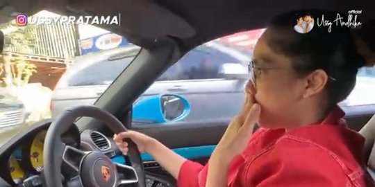 uduk naik mobil porsche rev1