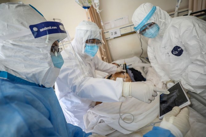 penangan virus corona di rs palang merah wuhan