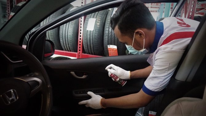 bengkel carfix bikin layanan gratis disinfektan kepada pelanggan demi cegah covid 19