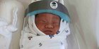 Antisipasi Corona, Bayi Baru Lahir di Thailand Dipakaikan Tameng Wajah