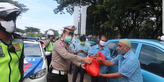 Komunitas Moge Salurkan Paket Sembako & Masker ke Warga Tangsel Terdampak Corona