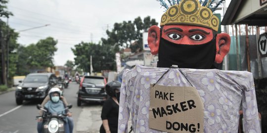 Uniknya Ondel-ondel Ajak Masyarakat Gunakan Masker