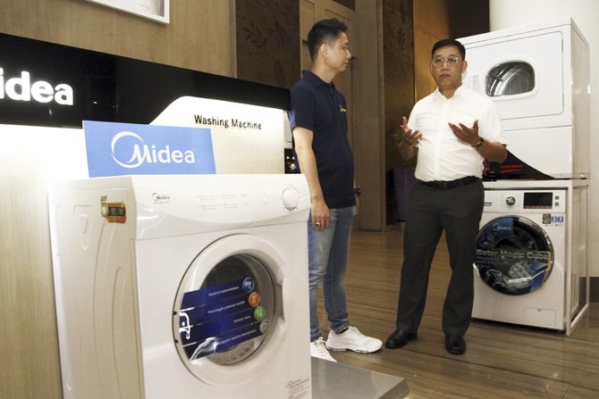 midea perkenalkan mesin cuci berkapasitas besar cocok untuk bisnis laundry